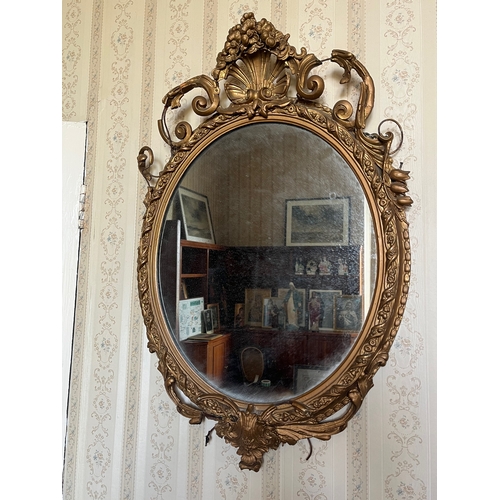 275 - Victorian Gilt Oval Shaped Mirror (62 cm W x 92 cm H)