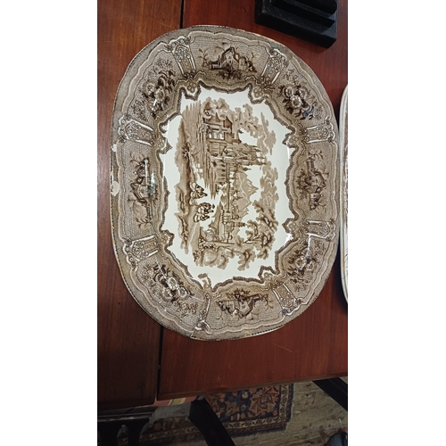 65 - Two Antique Brown and White Platters