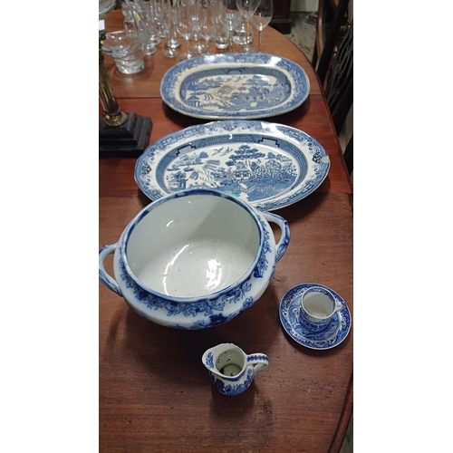 68 - Two Blue and White Willow Pattern Platters, a Spode Cup and Saucer, Jardiniere and a Milk Jug