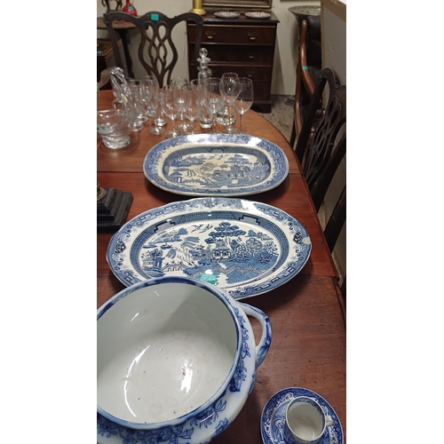 68 - Two Blue and White Willow Pattern Platters, a Spode Cup and Saucer, Jardiniere and a Milk Jug