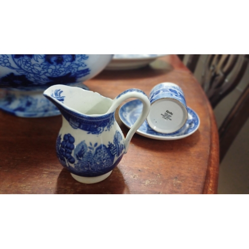 68 - Two Blue and White Willow Pattern Platters, a Spode Cup and Saucer, Jardiniere and a Milk Jug