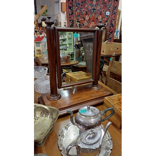 328 - 19th Century Mahogany Table Mirror on tapered columns with a plain stepped base