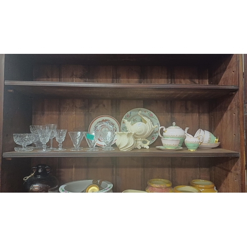 495 - Shelf lot to include Beleek, Oriental Plates, Glassware and a part Tea Set