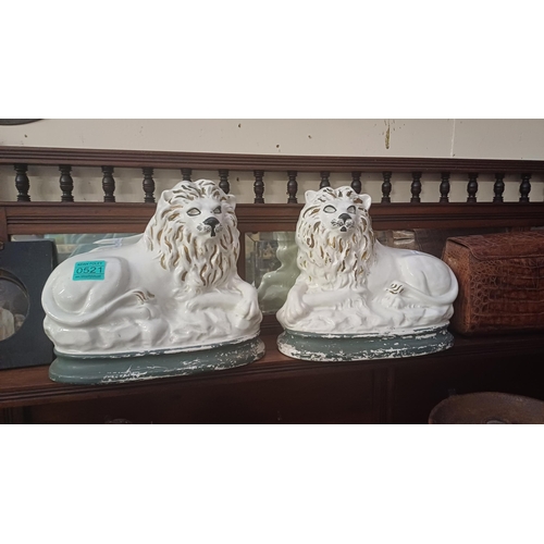 521 - Pair of Staffordshire Recumbent Lion Figures