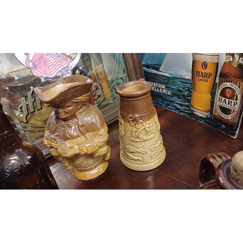 576 - Two Antique Toby Jugs, an Ale Pot and 2 Whiskey Crocks