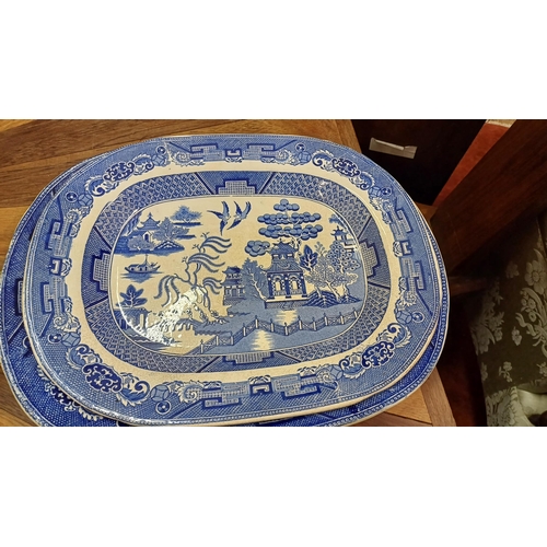 631 - Three Blue and White Willow Pattern Platters