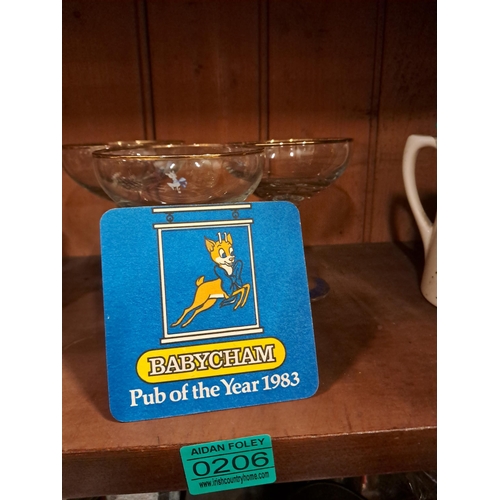 206 - Three Babycham Glass Saucers and a Drip Mat