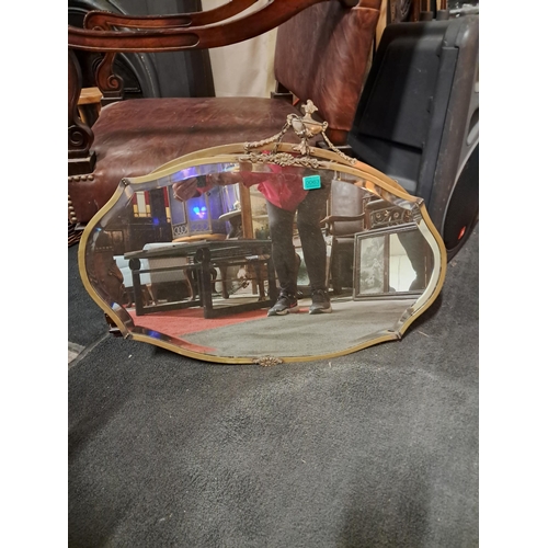 63 - Two Edwardian Brass Framed Oval Mirrors