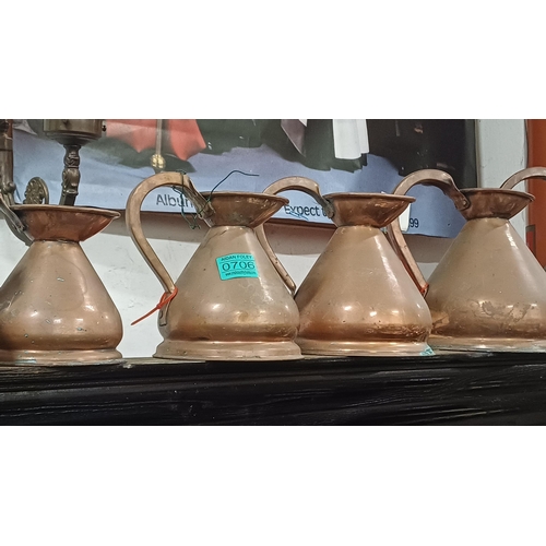 706 - Set of 9 Graduated Copper Measures