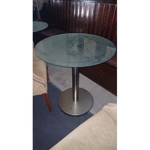 823 - Two Glass top Circular Coffee Shop Tables on weighted bases