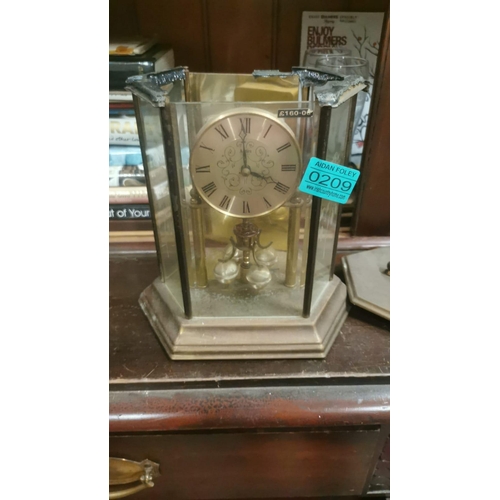 209 - Anniversary Clock and a Brass Restaurant Sign (as found melted ) Anniversary Clock rescued  from Wil... 