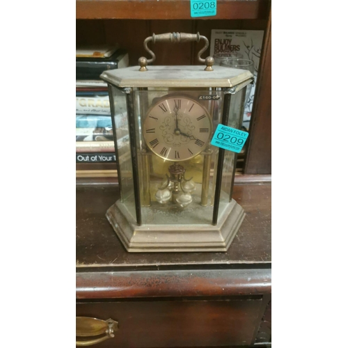 209 - Anniversary Clock and a Brass Restaurant Sign (as found melted ) Anniversary Clock rescued  from Wil... 