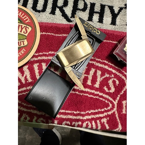 562 - Two Murphys Irish Stout Drip Mats, Tie Pin, Zippo type Money Clip, Penknife and Drip Mats