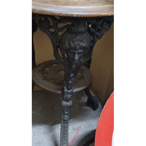 39 - Ladies Head Cast Iron Pub Table with Pine Top