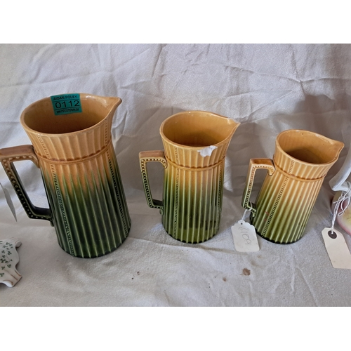 112 - Set of 3 Pottery Dresser Jugs of Graduated From (Tallest 22cm) together with 2 others (one chip)