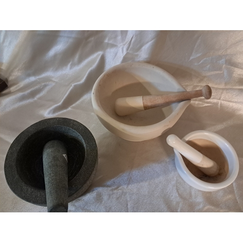 146 - Three good Mortar and Pestles