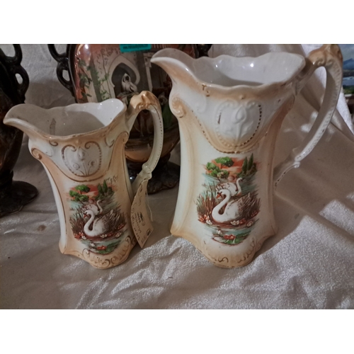 168 - Pair of Edwardian Vases and a Set of 2 Graduated Dresser Jugs