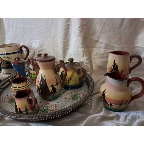 205 - Good collection of Torquay Ware Pottery Jugs, Tea Pots, Bowls etc on Tray (11)