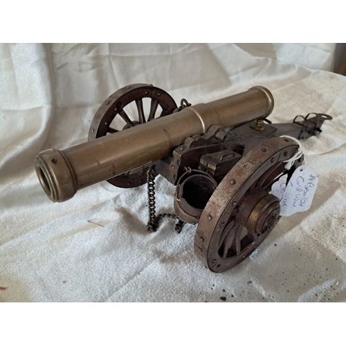 46 - Mid 20th Century Bronze and Mahogany Desk Cannon (46cm Long)