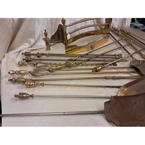 704 - Large Mixed lot of Brass Fire Irons and a Grate