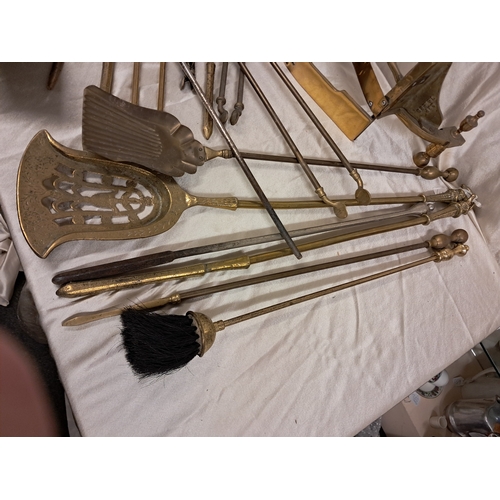 704 - Large Mixed lot of Brass Fire Irons and a Grate