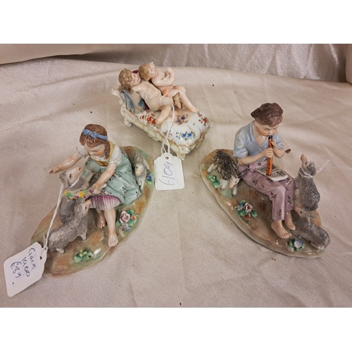 711 - Three Decorative Continental Porcelain Figural Groups (Tallest 11cm)