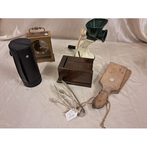 799 - Collection to include a Novelty Cigarette Box, Mincer, Butter Pats, Clock, Tongs and a Drink's Box