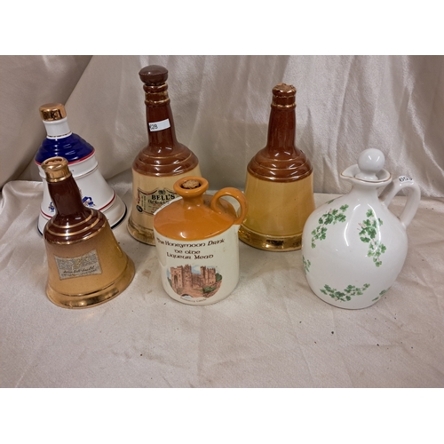 805 - Bunratty Mead Crock, Wade Irish Shamrock Whiskey Crock together with 4 Bells Scotch Decanters