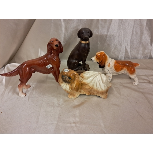 815 - Lot of Dog Figures including Beswick, Royal Doulton, Melba Ware and 1 other