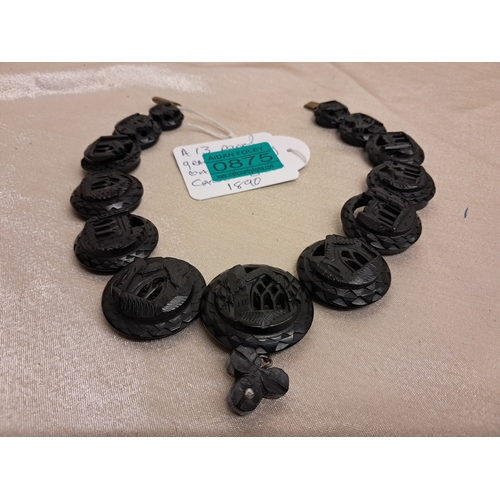 875 - Irish Bog Oak Necklace consisting of 13 circular Carved Panels of Castles and Abbeys (40cm Long)