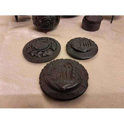 878 - Collection of 19th Century Irish Bog Oak including Skillet Pot, Inkwells, Pill Box and 3 Carved Lids