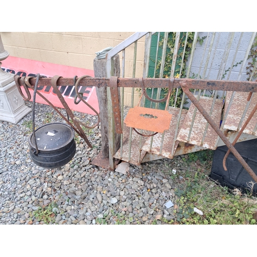 1056 - Victorian Cast Iron Fire Crane with various Hangers and a large Skillet Pot