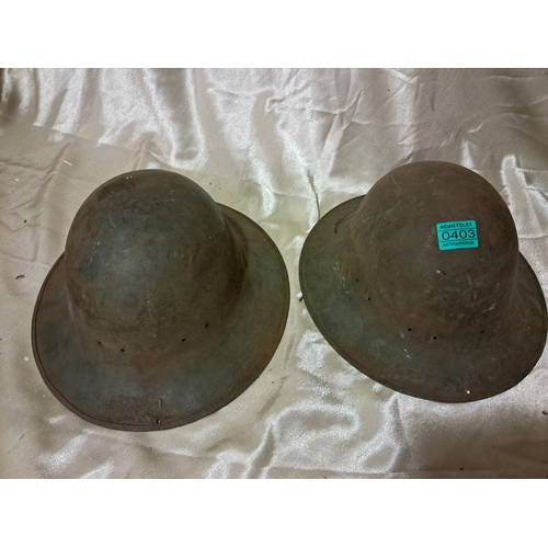 403 - Two World War 1 Soldier's Helmets