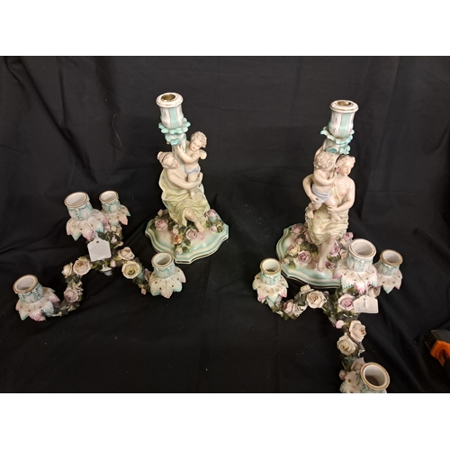 537 - Pair of German Porcelain Figural Candelabra with encrusted Floral Decoration (49cm Tall)