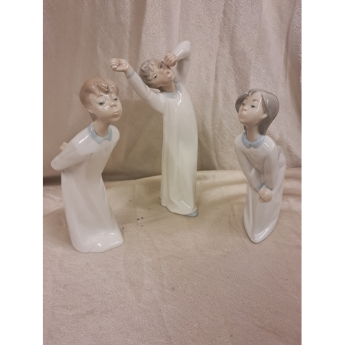 696 - Three Lladro Figures of Children at Bedtime (Tallest 22cm)