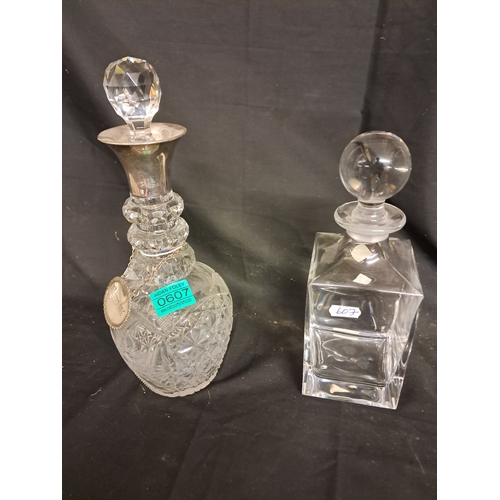 607 - Triple Ring Cut Glass Decanter with Birmingham Silver Collar together with another Decanter