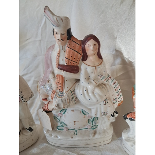 120 - Three Staffordshire Pottery Figures including 