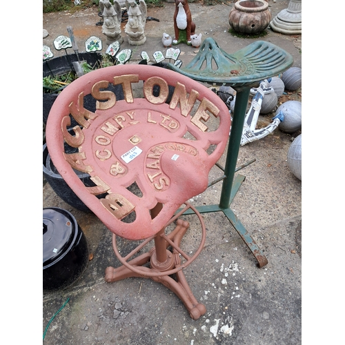 1063 - Two Cast Iron High Stools - one with a revolving seat