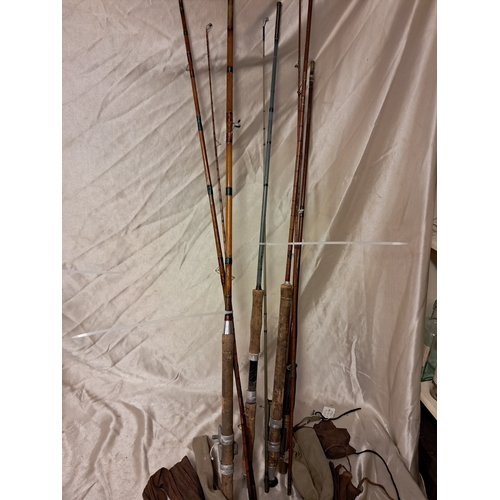 1365 - Collection of 3 Split Cane Fishing Rods and one other with bags (two with reels)