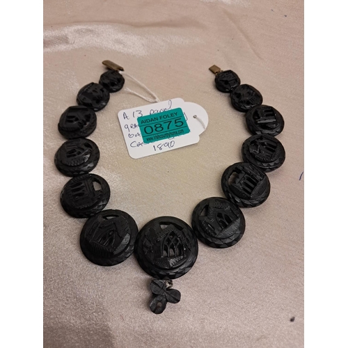 875 - Irish Bog Oak Necklace consisting of 13 circular Carved Panels of Castles and Abbeys (40cm Long)