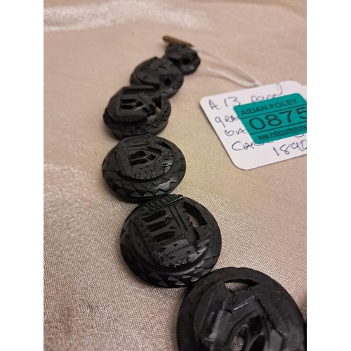 875 - Irish Bog Oak Necklace consisting of 13 circular Carved Panels of Castles and Abbeys (40cm Long)