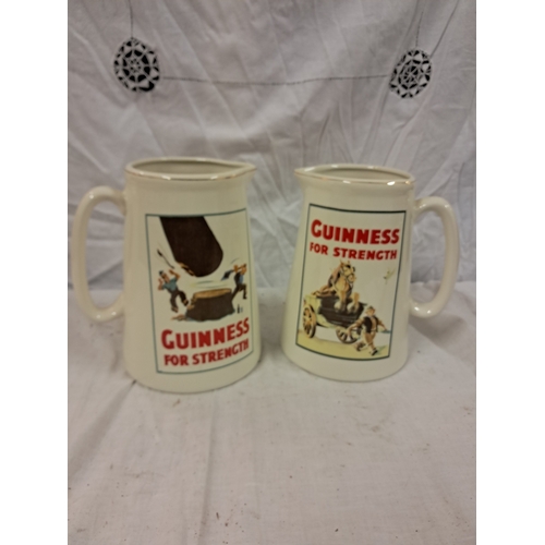 58 - Two Guinness Pottery Jugs (modern) - 22cm Tall