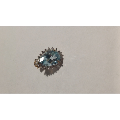 307 - 9 Carat Blue Topaz Cluster and Diamond Earrings