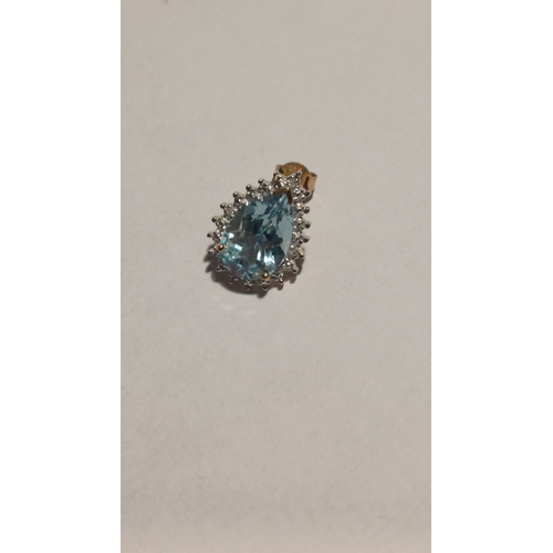 307 - 9 Carat Blue Topaz Cluster and Diamond Earrings