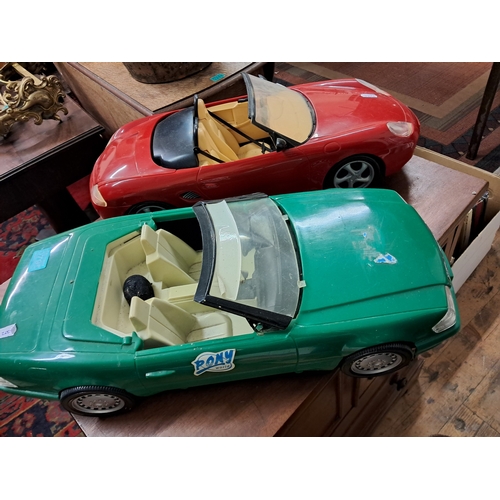 795 - Two oversize Plastic Model Cars