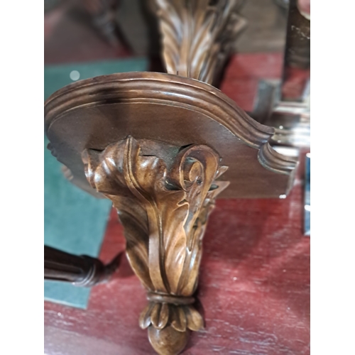 196 - Pair of Hardwood Wall Brackets with Acanthus Leaf supports together with a Pair of Mirror Glass Cand... 