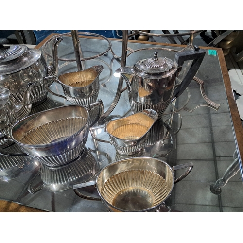 299 - Silver Plated Tea Service (7 pieces) including 3 Pots, 2 Jugs and a 2 Sugar Bowls