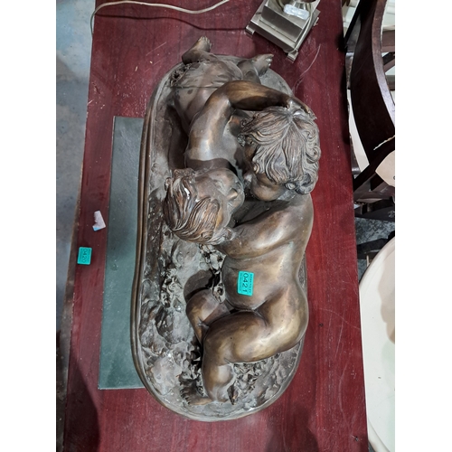 421 - Large Impressive Bronzed Figure of Cherubs embracing (80cm x40cm x 35cm)