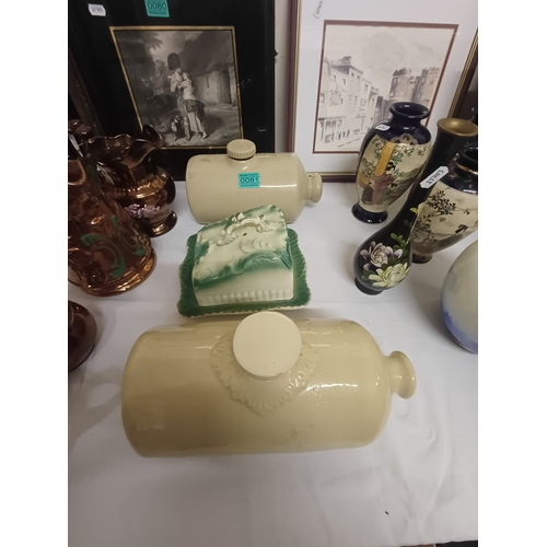 81 - Two Ironstone Water Bottles and a Pottery Butter Dish
