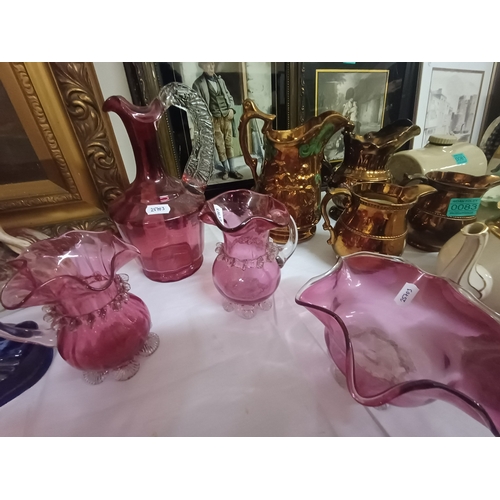 85 - Collection of Cranberry Glass including Decanter, Jugs, Lidded Jar and Bowl